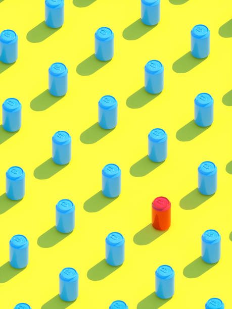 istock Set of many blue soda cans and a red can on yellow background. 3d render 1373151173