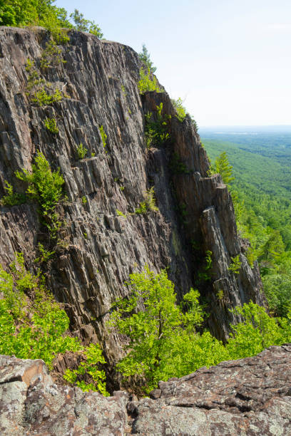 istock Sheer basalt cliff on Mount Tom in Holyoke, Massachusetts. 1373153399