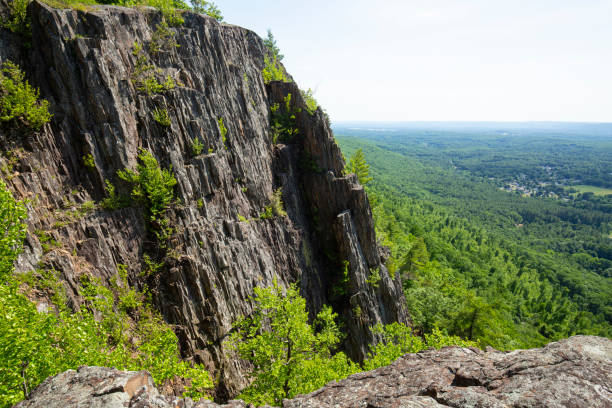 Steep vertical cliffs of volcanic rock on Mount Tom in the Holyoke Range of southern Massachusetts.