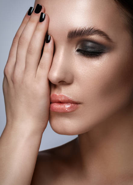 istock Beautiful woman with stylish make-up 1373155458