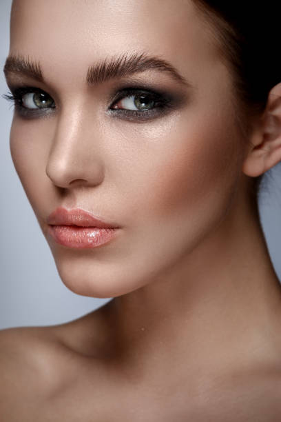 istock Beautiful woman with stylish make-up 1373156170