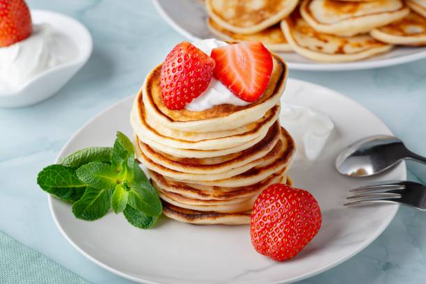 istock Stack of pancakes with fresh strawberry 1373156219