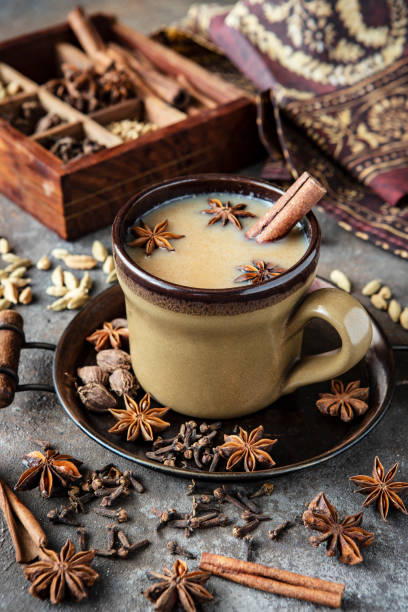 istock Indian masala chai tea. Spiced tea with milk  and spices 1373156415