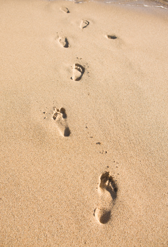 Footprints leading to the beach.  Kauai Hawaii