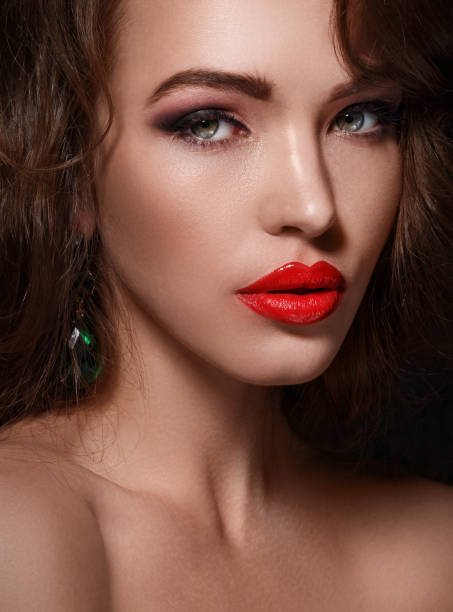 istock Beautiful woman with red lips 1373157946