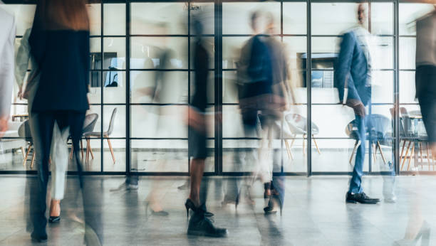 Place of work Busy modern workplace. Working process in the office, business people working, walking and talking, blurred motion businessman photos stock pictures, royalty-free photos & images