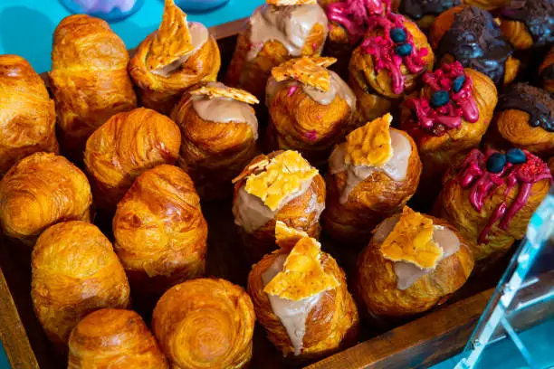 Photo of Assorted sweet yeast dough cruffins with various topping