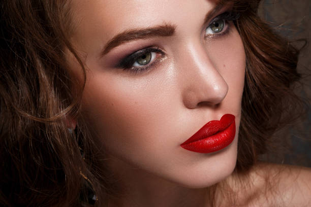istock Beautiful woman with red lips 1373159197