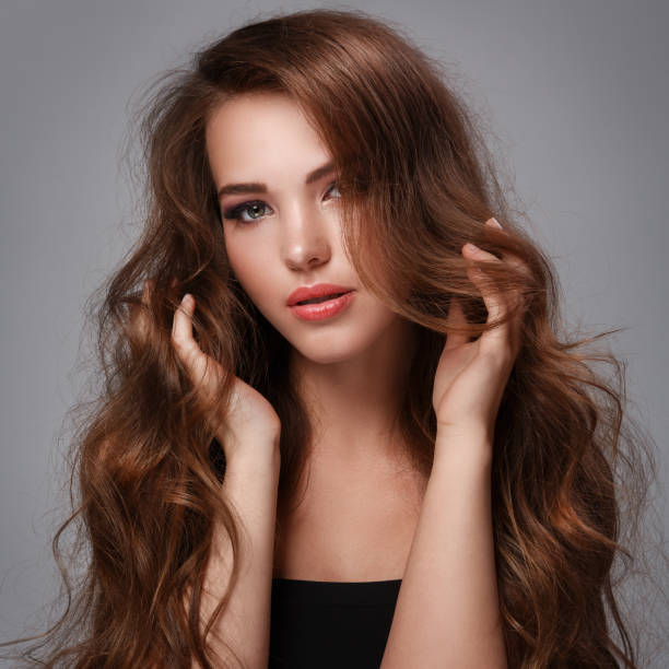 istock Woman with long glossy hair 1373160187
