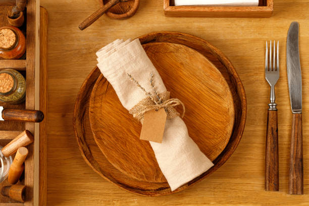 istock Nature Rustic Serving with a wooden plate, napkin, knife and forks. Wedding serving idea. Dinner time. 1373163859