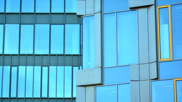 istock Urban abstract - windowed wall of office building. 1373164349