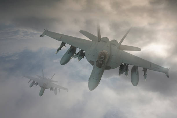 istock Jet fighters flying over the clouds. 1373165071