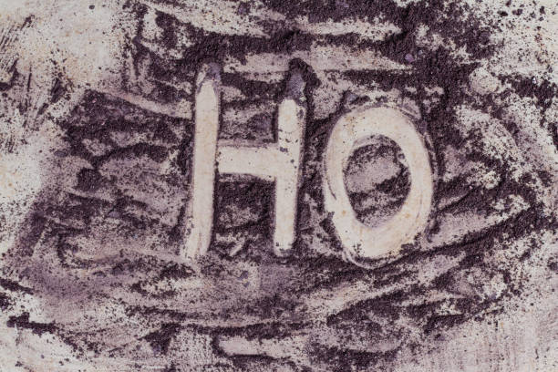istock HO inscription drawn by purple color powder paint 1373166327