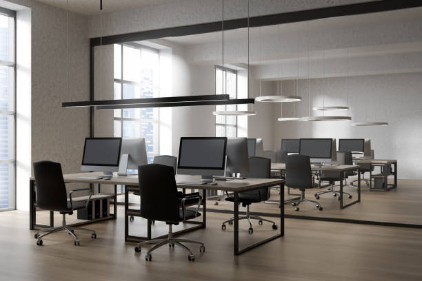 istock Bright office room interior with workplaces and panoramic windows 1373166454