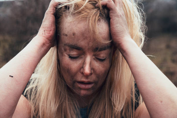Despair Woman portrait in after fire in the house