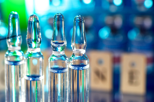 Close up shot of vaccine glass ampoules in a laboratory