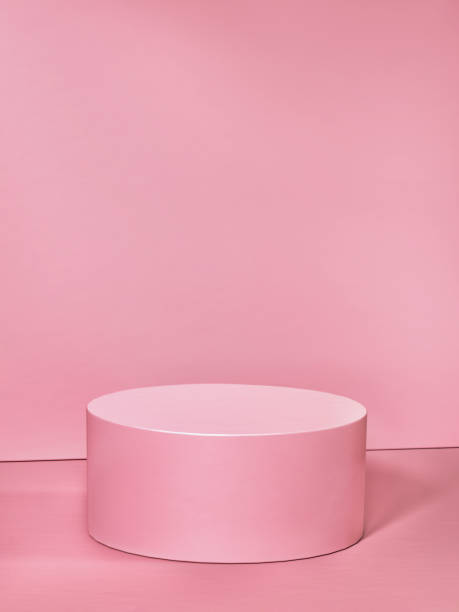 istock Pink cylindrical podium. 3d computer graphic template of displaying place for your products. 1373166703