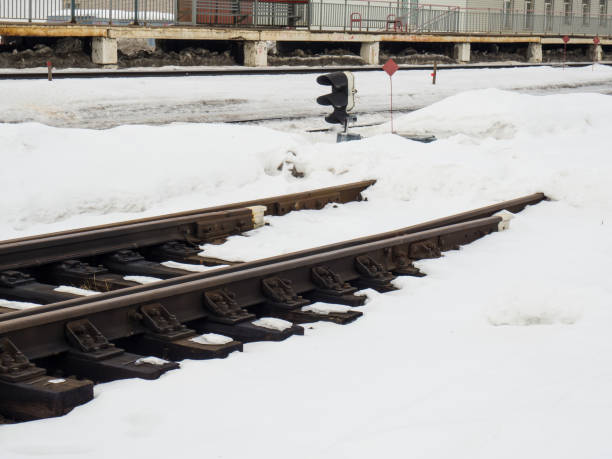 istock railway tracks are covered with snow. rails are covered with snow 1373170386