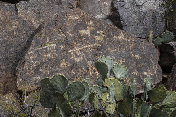 Petroglyphs chipped into stone located on a clif face in Agua Fria National Monument in the Sonoran Desert region of Arizona.