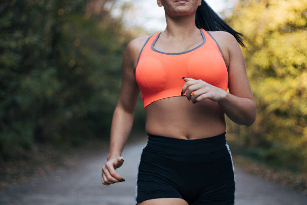 istock young woman exercising in nature 1373174445