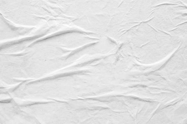 istock white crumpled and creased paper poster texture background 1373189701