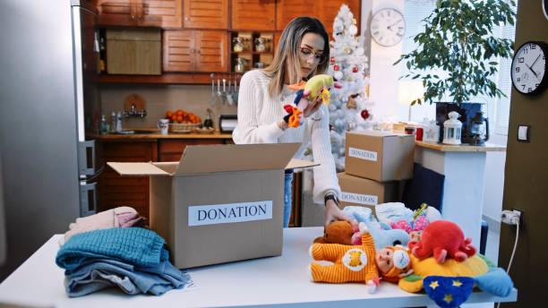 istock Preparing donation boxes during the winter holidays. Christmas charity. 1373190011