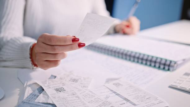 istock Young woman doing her home finances. 1373190077