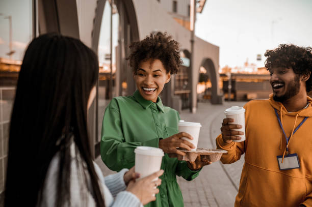 istock Group of young people in a street 1373190828