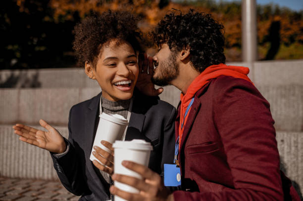 istock Young couple having coffee outside and feeling excited 1373190867