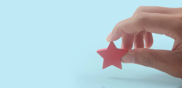 istock Rise on increasing five stars in human hand, Increase rating evaluation 1373225941