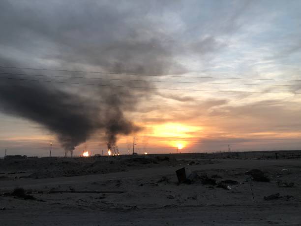 istock Air pollution, black smoke at sunset 1373226094