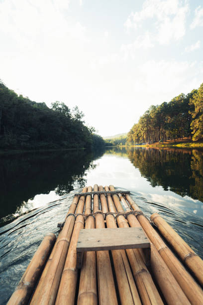 istock bamboo raft in the water, nature tourism 1373227912