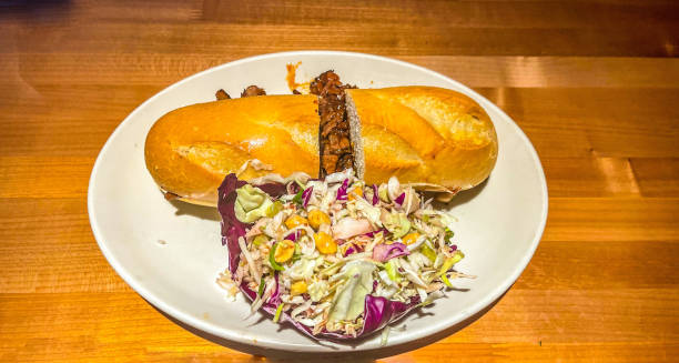 istock Tri tip sandwich and a side of coleslaw 1373231027