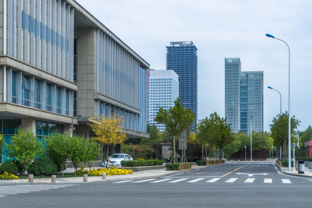 istock empty road with zebra crossing and skyscrapers in modern city 1373231954