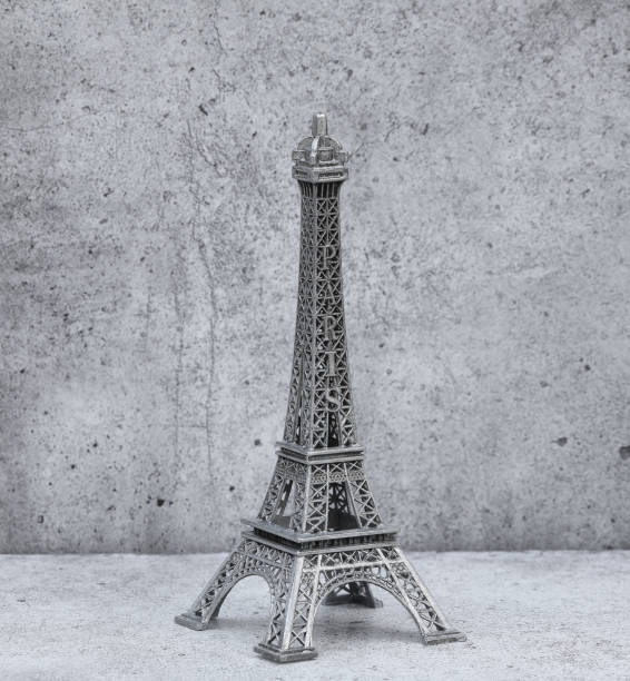 istock figurine of the Eiffel Tower on a gray background 1373243955