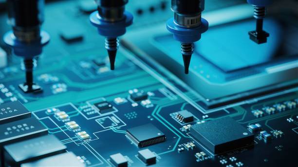 istock Macro Shot of Generic Printed Circuit board with Chips and other Components During Production Process . Electronics Manufacturing. Dark Environment 1373244192