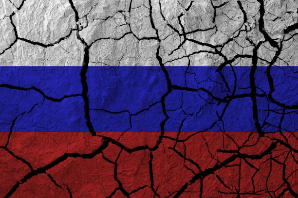 Russian flag in the cracks. stock photo