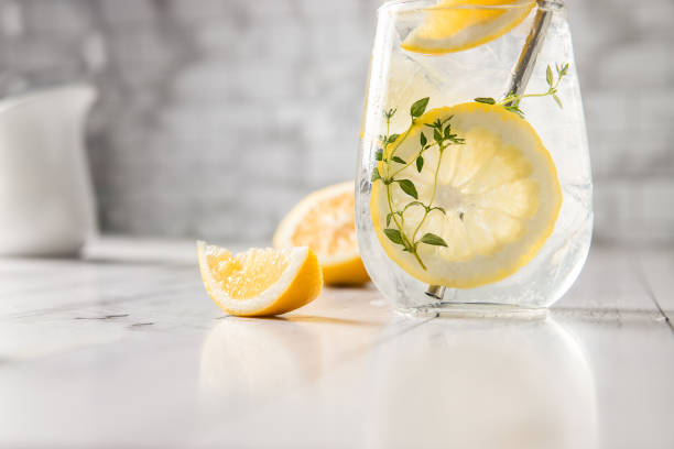 istock fresh home made lemon lemonade served for refreshment on white wooden table, copy space, healthy dieting, well being, antioxidant 1373246883