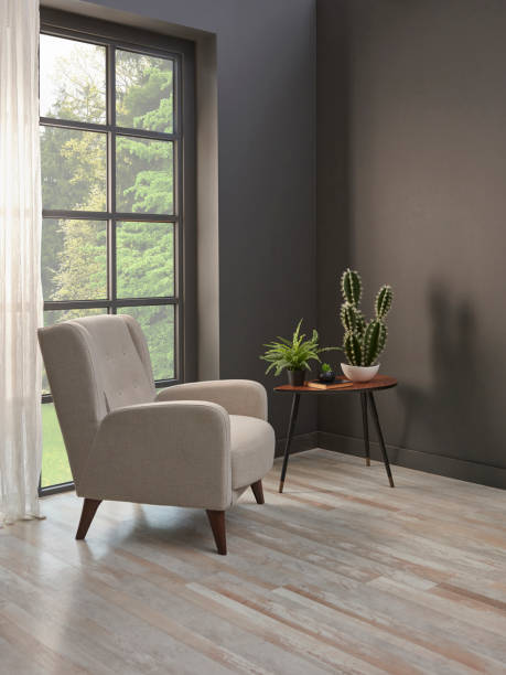 istock Corner room grey wall with windows style, sofa table chair and plant concept. 1373248226