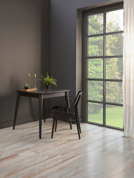 istock Corner room grey wall with windows style, sofa table chair and plant concept. 1373248251