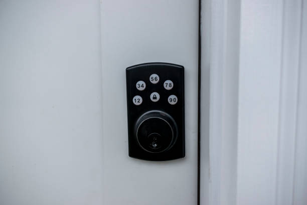 istock Front angle view of a front door lock, with both key and pin number secure entry options 1373249543