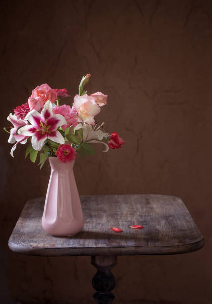Pink Lilies in a Blue Vase in a Bright Room