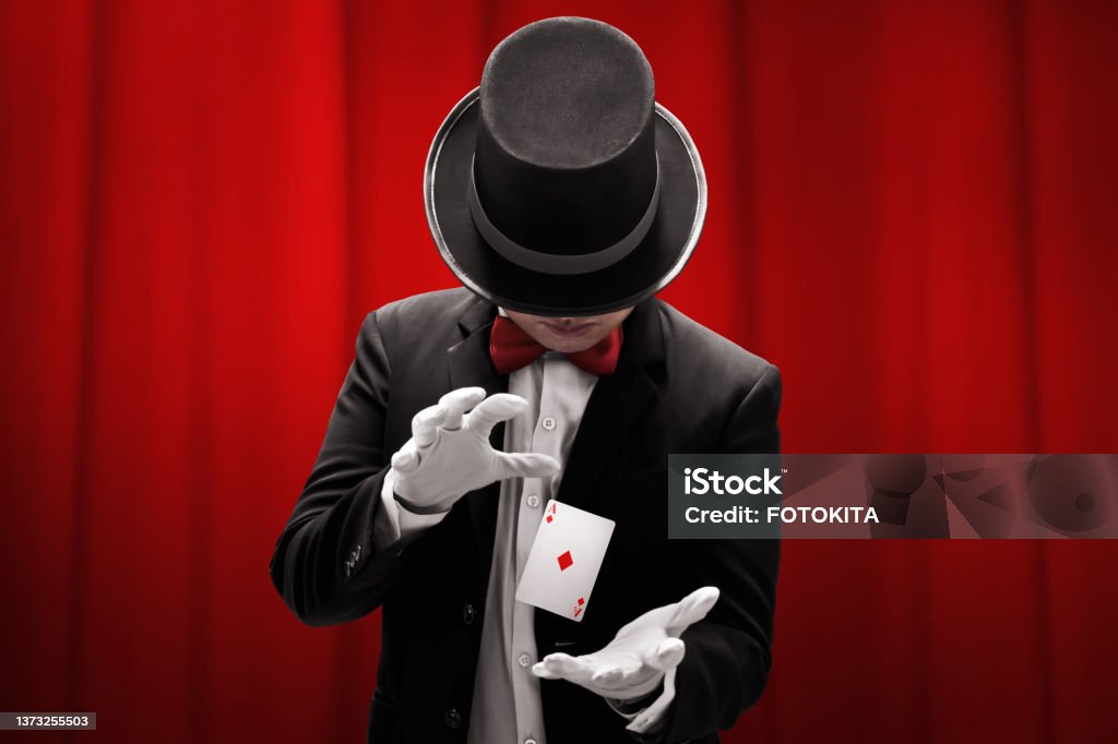 Magician hands showing magic trick Magician Stock Photo