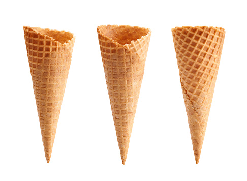 different angle of empty waffle ice cream cone isolated on white background