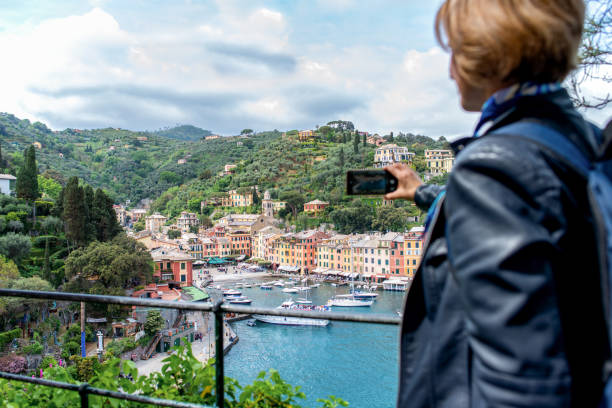 istock Tourist in Portofino capturing travel experience 1373257232
