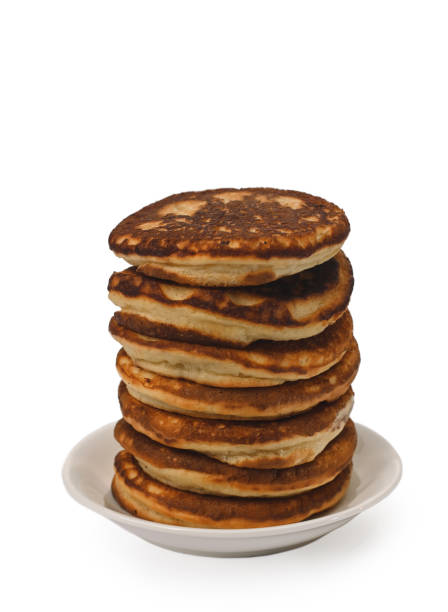 istock A stack of pancakes on a white plate. isolated on a white background 1373258040