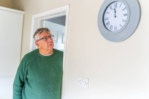 istock Senior Caucasian man peering around doorway 1373258334