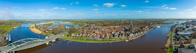 Hasselt on the banks of the Zwarte Water river with high water level in Overijssel, The Netherlands.The river is overflowing on the floodplains after heavy rainfal upstream in The Netherlands and Germany during storm Eunice and Franklin in February 2022.