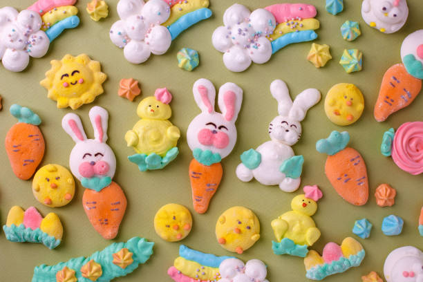 istock Sweets, pastry, gingerbread cookies for Easter table. Easter rabbit bunny, tender rainbow on green background top view copy space, spring seasonal holiday banner for your site, flyer, coupon 1373262495