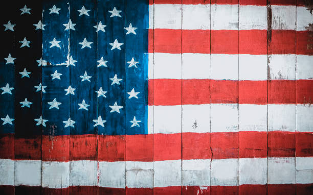 istock American flag painted on old wood plank background 1373263878